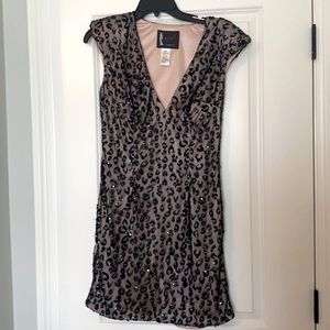 Black/champagne dress with leopard beaded detail